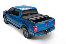 Load image into Gallery viewer, Lund 99-17 Ford F-250 Super Duty (6.5ft. Bed) Genesis Elite Tri-Fold Tonneau Cover - Black