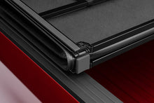 Load image into Gallery viewer, Lund 04-06 Chevy Silverado 1500 Fleetside (5.8ft. Bed) Hard Fold Tonneau Cover - Black