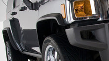 Load image into Gallery viewer, Husky Liners 06-10 Hummer H3 OE Style Black Fender Flares - 4pc