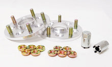 Load image into Gallery viewer, Project Kics 15mm Thick 12x1.5 5x114.3 to 5x100 Wide Tread Spacers PCD Conversion