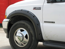 Load image into Gallery viewer, Lund 99-07 Ford F-250 RX-Rivet Style Smooth Elite Series Fender Flares - Black (4 Pc.)