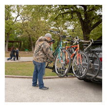 Load image into Gallery viewer, Curt Tray-Style Hitch-Mounted Bike Rack (4 Bikes 2in Shank)