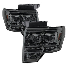Load image into Gallery viewer, xTune Ford F150 09-14 Projector Headlights Halogen Model Only LED Halo Smoked PRO-JH-FF15009-CFB-SM