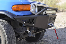 Load image into Gallery viewer, Addictive Desert Designs 07-14 Toyota FJ Cruiser Stealth Fighter Front Bumper w/ Winch Mount