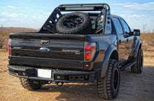 Load image into Gallery viewer, Addictive Desert Designs 10-14 Ford F-150 Raptor Dimple R Rear Bumper w/ Backup Sensor Cutout